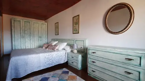 habitación-montsec-casa-rural-lleida-cal-curpets-agramunt-lleida Bonita habitación de estilo rústico en la casa rural Car Curpets.